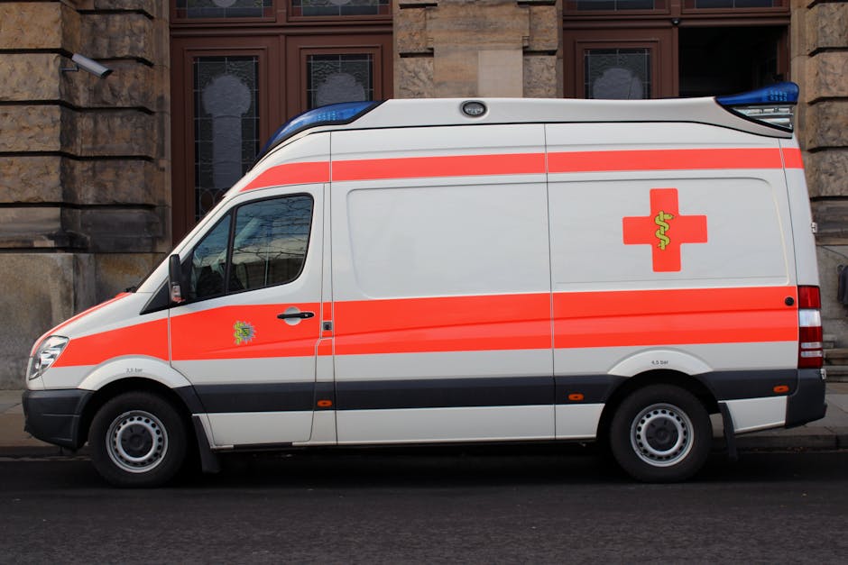 Emergency breakdown service van providing roadside assistance to stranded vehicle